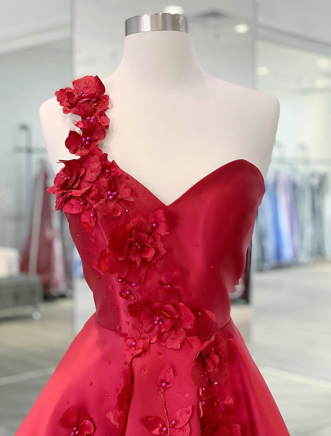Back view of a satin A-Line dress showing backless detail.