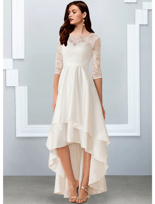 Model wearing an elegant A-line little white reception wedding dress with illusion neck and half sleeves.