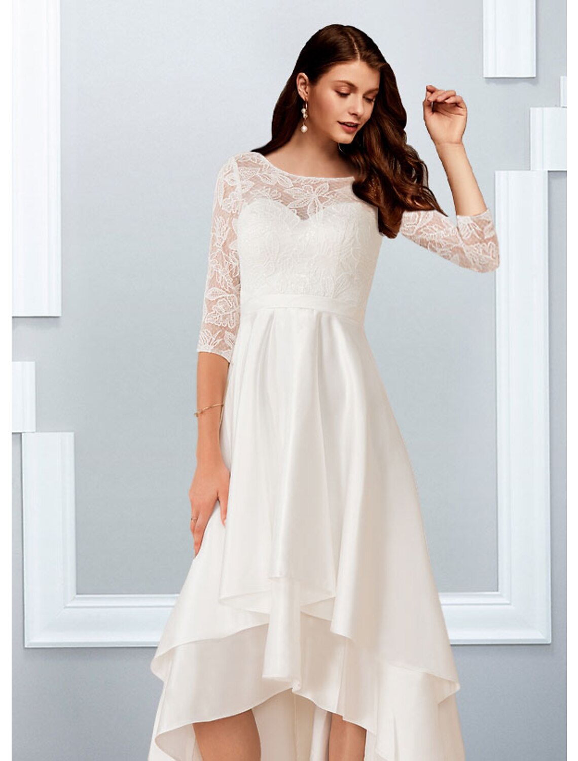 Side view of the A-line chiffon dress, highlighting the asymmetrical design and cascading ruffles.