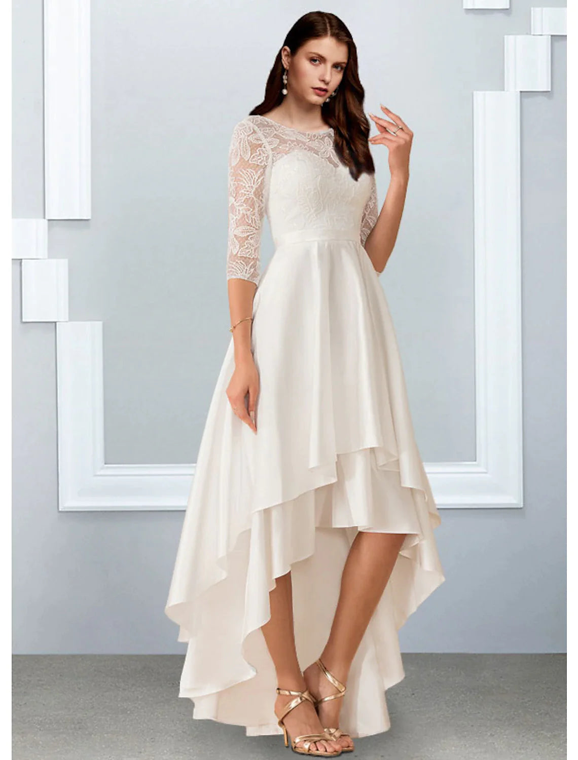 Close-up of the illusion neckline and delicate half sleeve detail on the chiffon dress.
