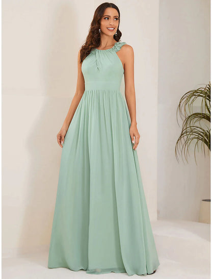 Side view of woman wearing a pleated A-line chiffon formal dress.