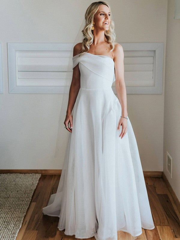 Full view of an elegant A-Line organza wedding dress with a one-shoulder neckline and ruched bodice, featuring a court train.