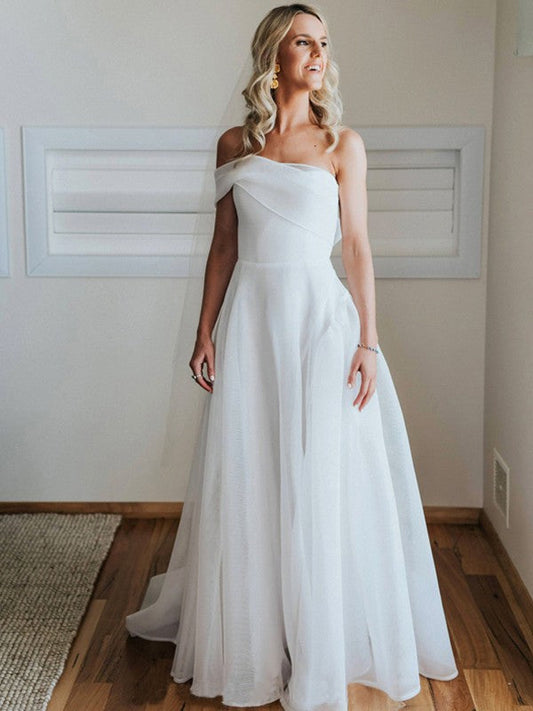 Full view of an elegant A-Line organza wedding dress with a one-shoulder neckline and ruched bodice, featuring a court train.