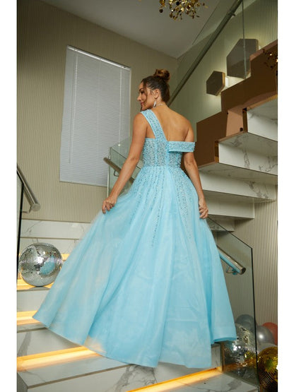 Back view of the sleeveless organza evening dress, showcasing its flowing skirt.