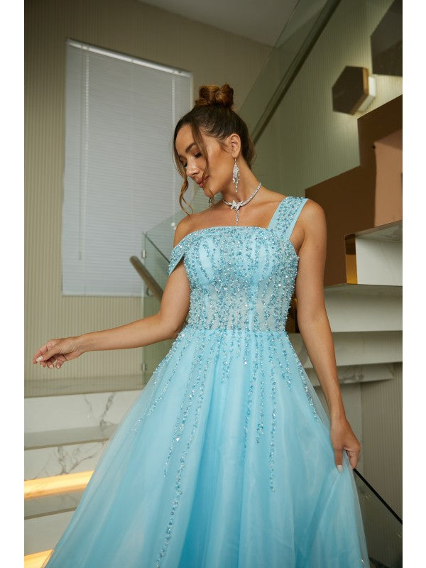 Side profile of the elegant aqua blue gown, highlighting the A-line silhouette.