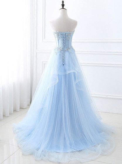 Full view of a sleeveless A-Line Princess gown with sweep train.