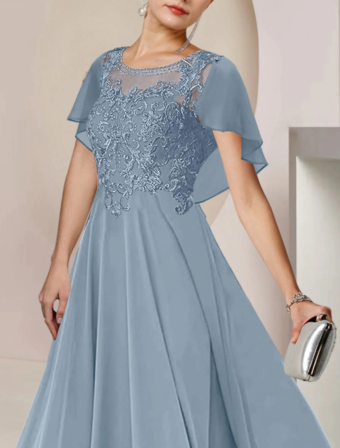 Back view of the tea length Mother of the Bride gown.