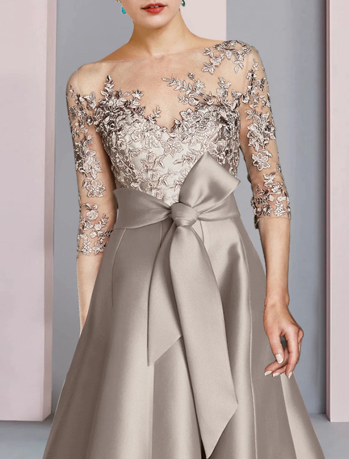 Back view of the elegant tea-length A-line dress, perfect for wedding guests.