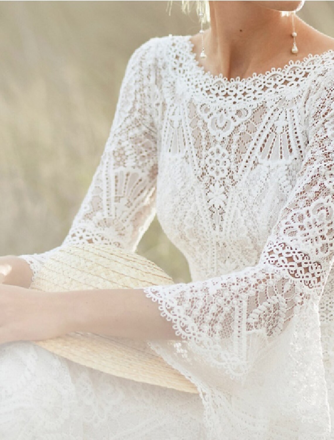 Back view of the wedding dress showing the elegant sweep train.