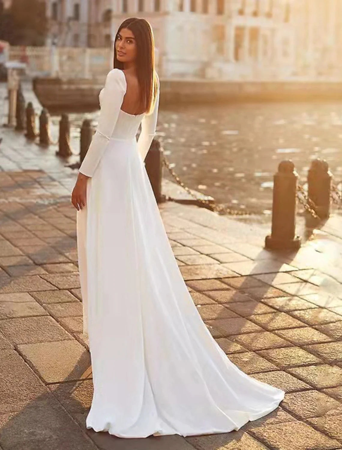 Back view of the A-line satin wedding dress, showing the sweep train.