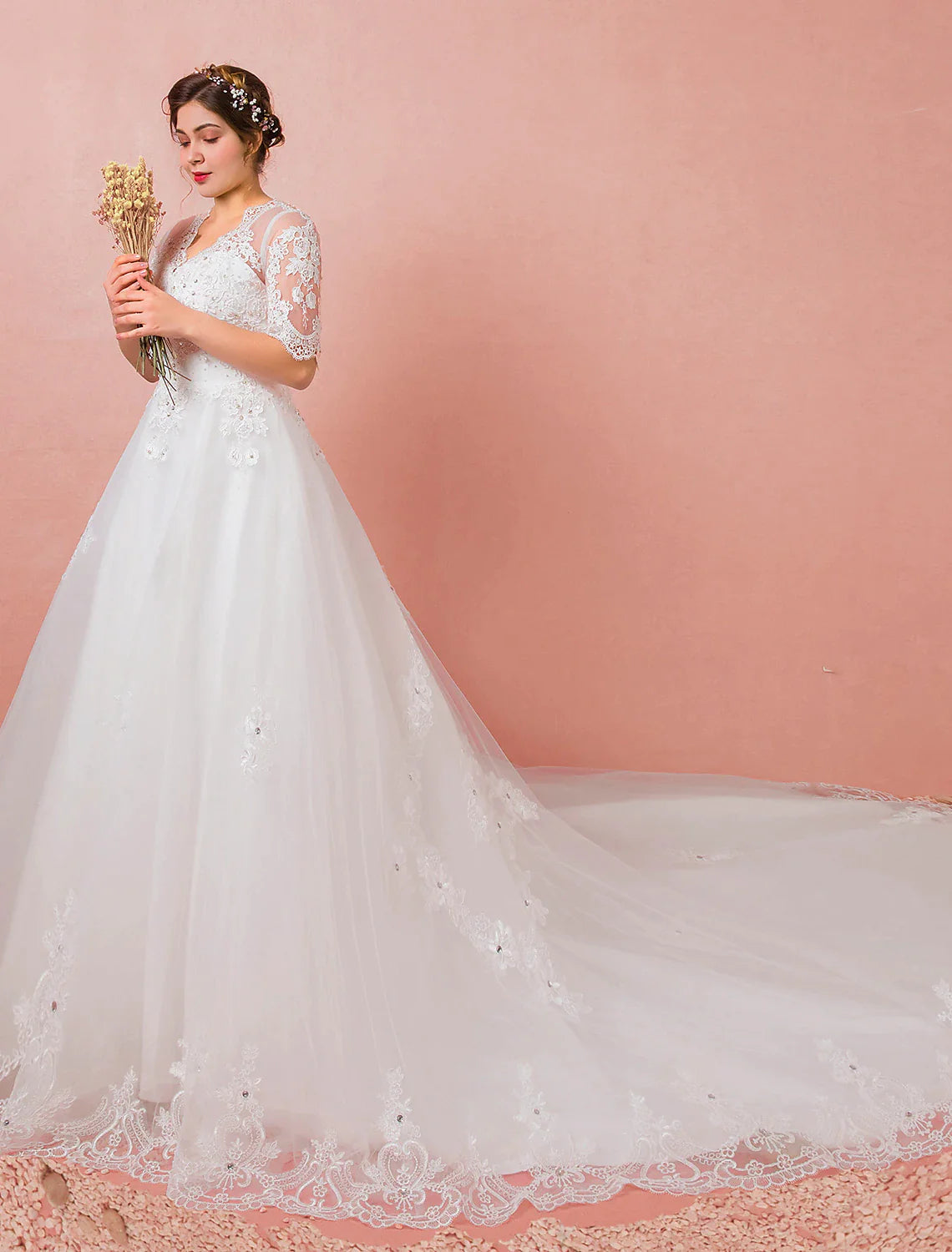 Side profile of the A-Line satin wedding dress, highlighting its flowing silhouette.