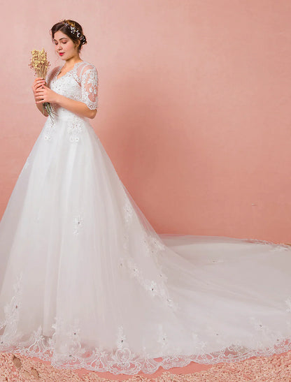 Side profile of the A-Line satin wedding dress, highlighting its flowing silhouette.