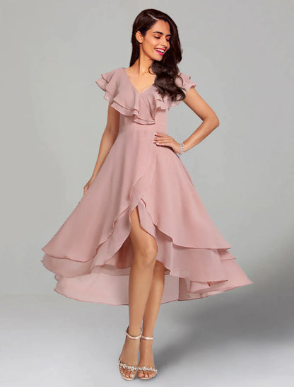 Woman wearing an elegant A-line V-neck short sleeve tea length chiffon dress with a front slit.