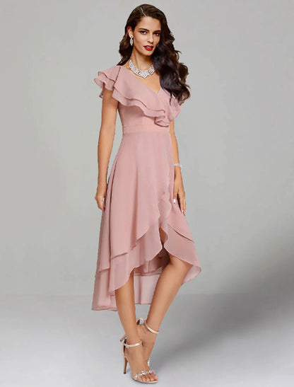 Back view of a woman in the A-line V-neck short sleeve chiffon tea length dress.