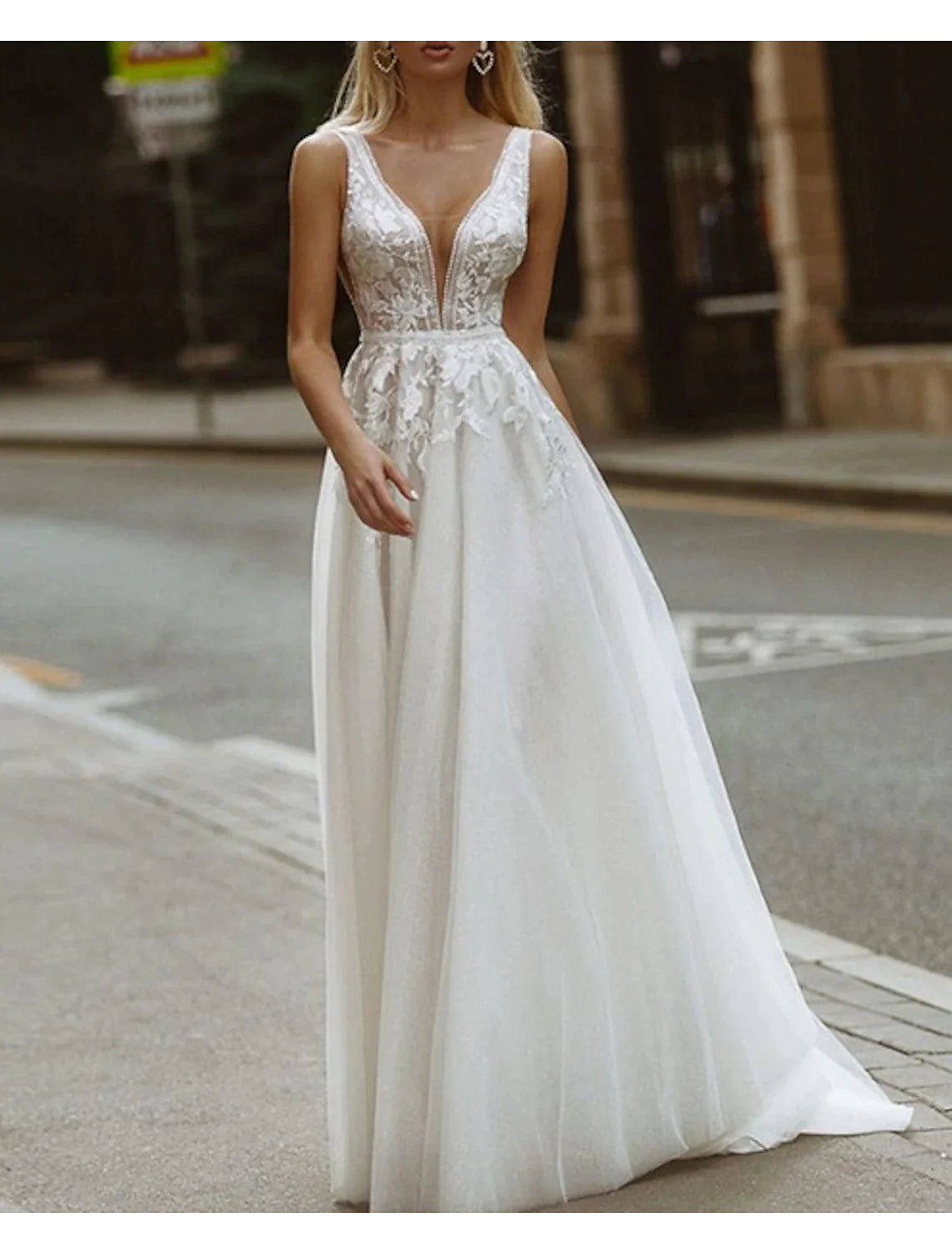 Back view of the A-Line wedding dress showcasing the sweep train.