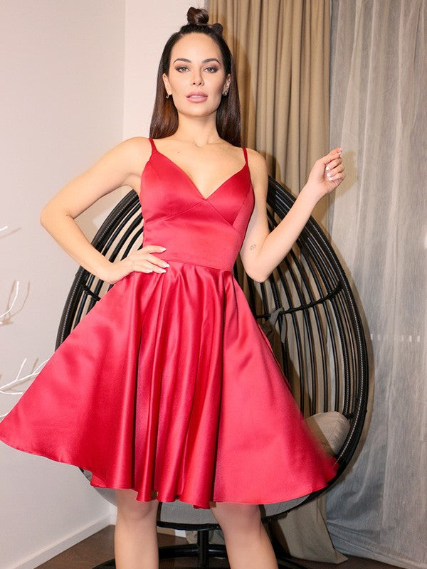 Elegant A-line satin homecoming dress with V-neck and sleeveless design.