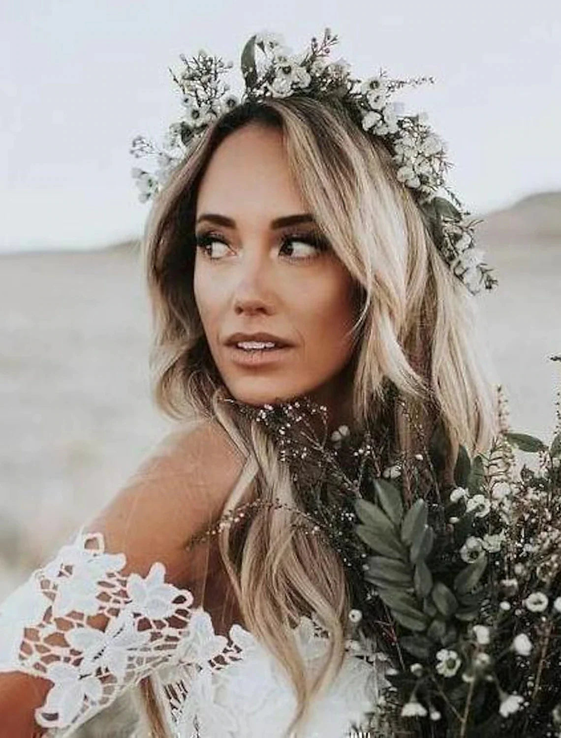 Close-up of the off-shoulder neckline and cap sleeves on the bridal gown.