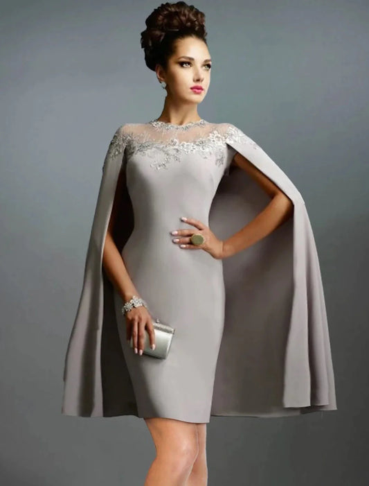Elegant mermaid trumpet evening gown with off-shoulder capes, ruched ruffles, and embroidery.