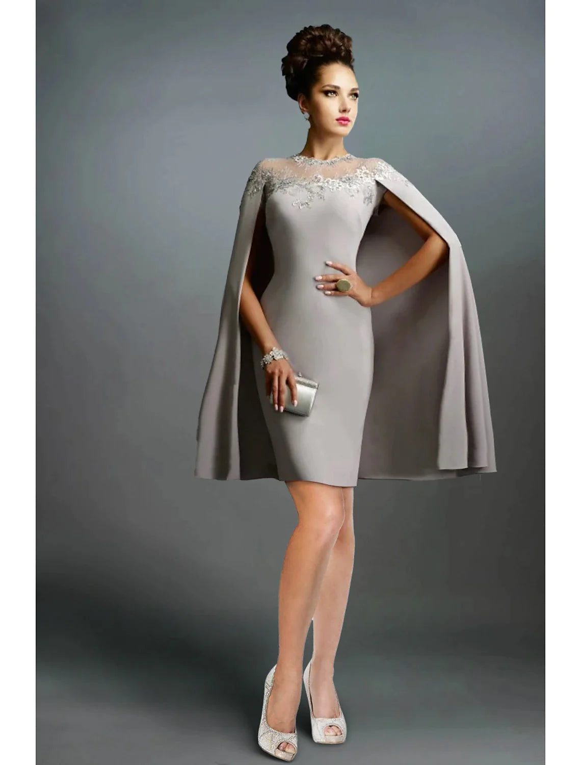 Side view of the mermaid trumpet evening gown, highlighting the off-shoulder design and intricate embroidery.