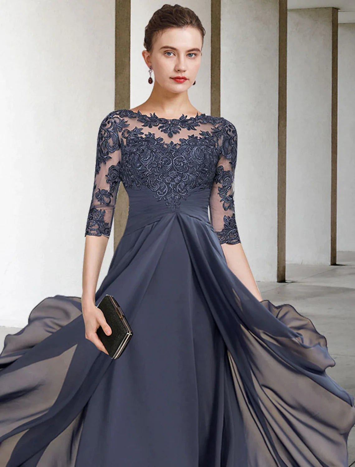 Side view of a plus size A-line high-low tea length dress, perfect for wedding guests.