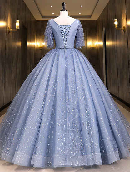 Back view of the floor-length Quinceanera ball gown, showcasing the full skirt.