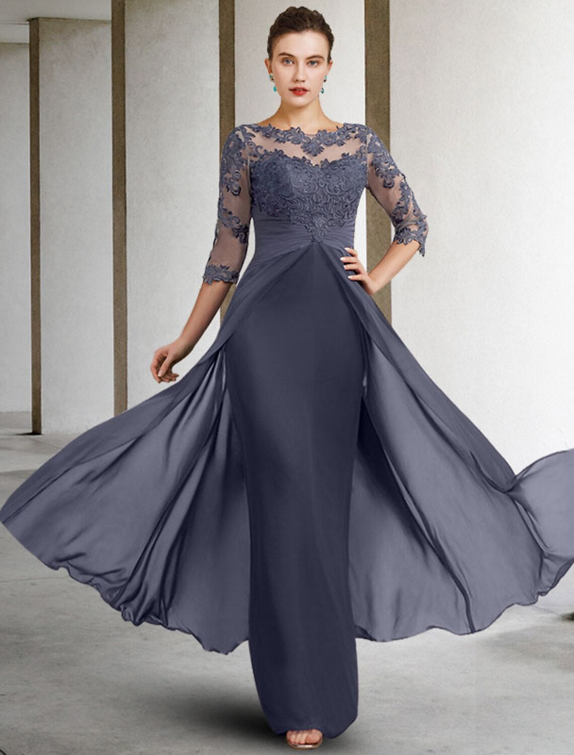 Elegant Mother of the Bride dress with jewel neck, 3/4 sleeves, and ruched lace details.