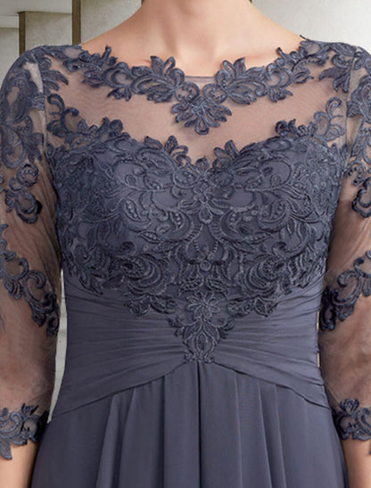 Close-up of ruched lace appliques and 3/4 sleeve on the Mother of the Bride dress.