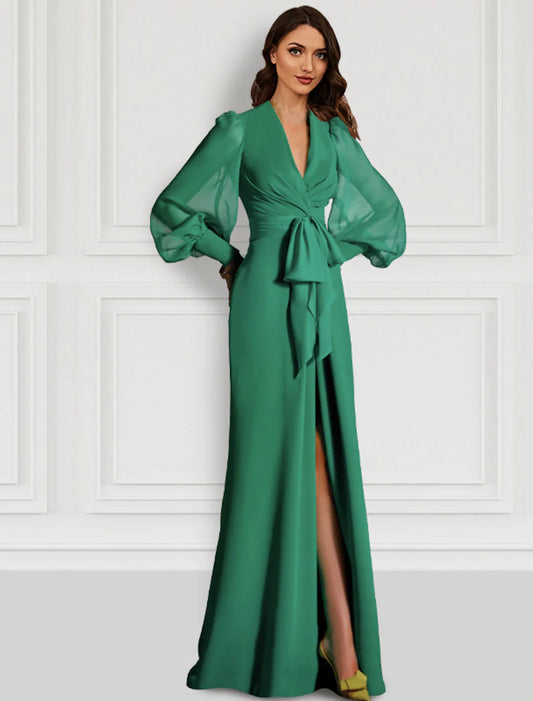 Elegant sage sheath evening gown with V-neck, long sleeves, and a front slit.