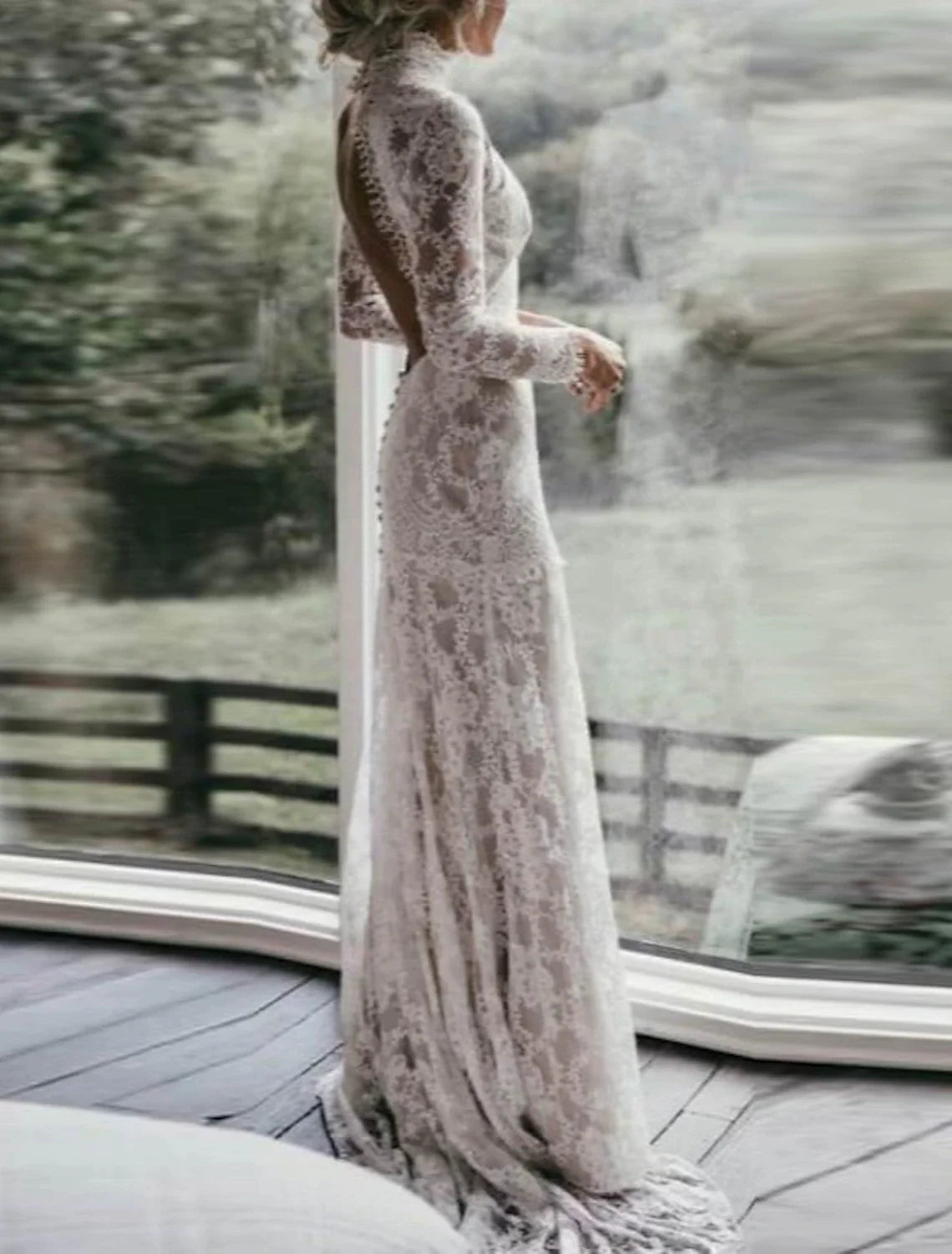 Detailed view of lace appliques on a bridal gown.