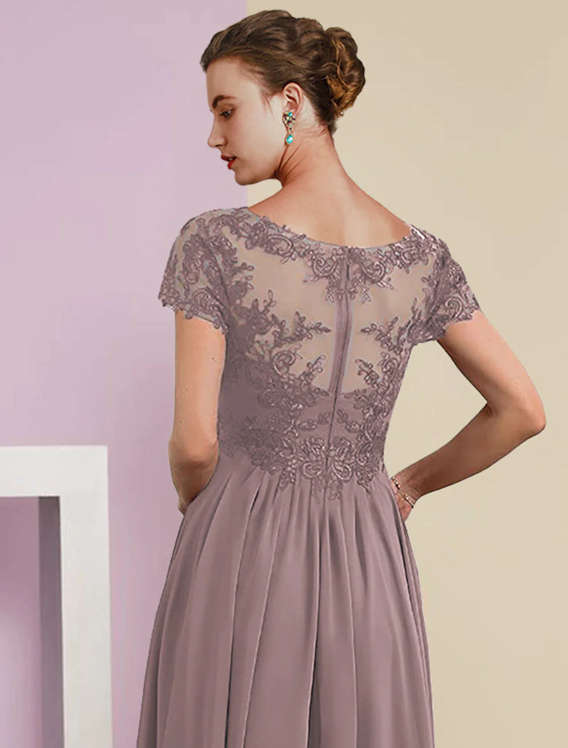 Side profile of the two-piece formal dress with a graceful silhouette.