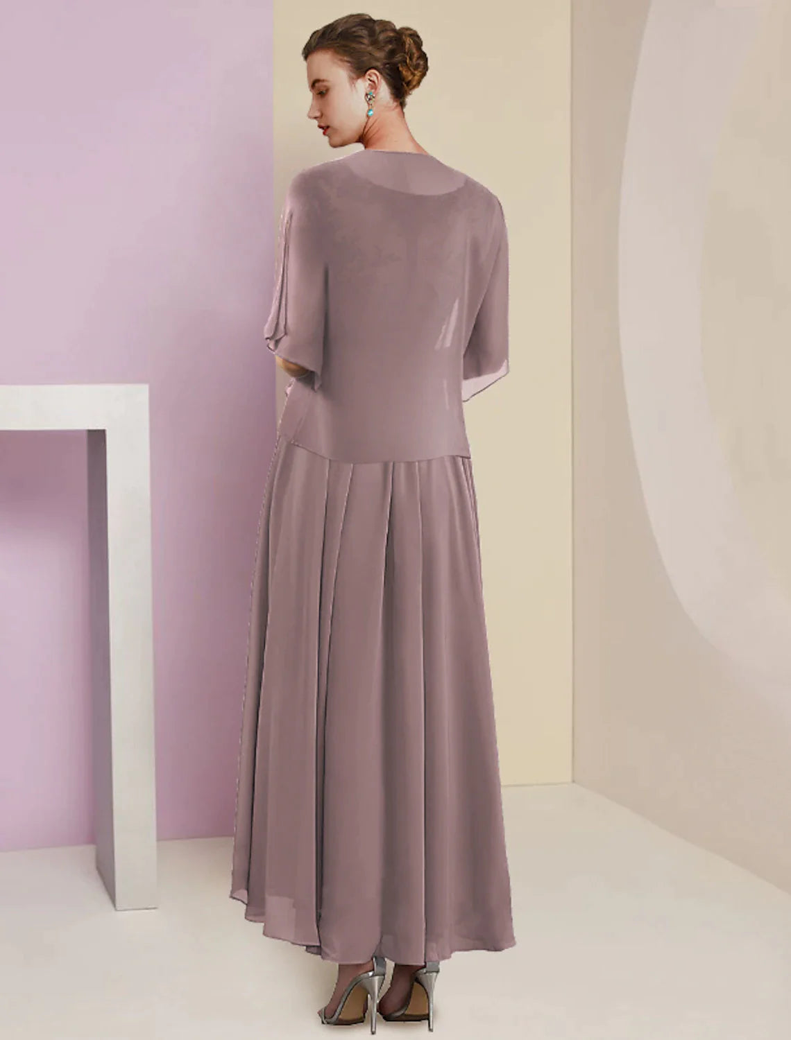 Mother of the bride dress shown with its coordinating wrap.
