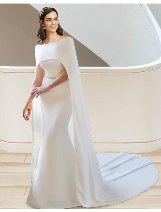 Elegant two-piece sweetheart strapless wedding dress with a flowing court train.