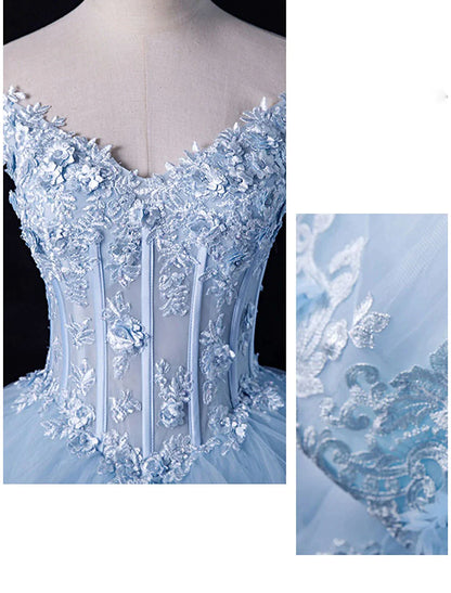 Backless white off-shoulder ball gown with pleats, back view.