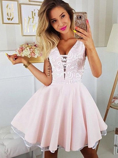 Full view of a satin A-Line short homecoming dress with V-neck and applique details.