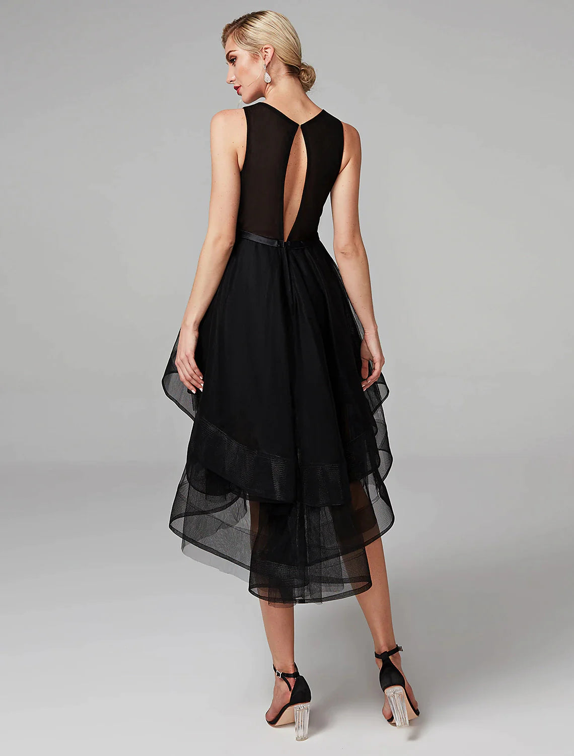 Back view of the jewel neck satin dress, highlighting the elegant silhouette.