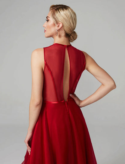 Woman posing in the shimmering A-line asymmetrical dress.