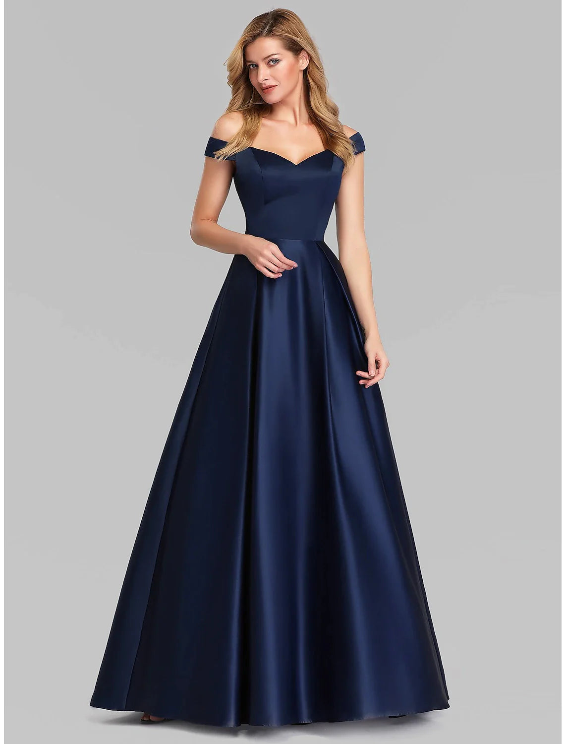 Close-up of the plunging neckline and ruched bodice on a dark charmeuse A-Line evening gown.
