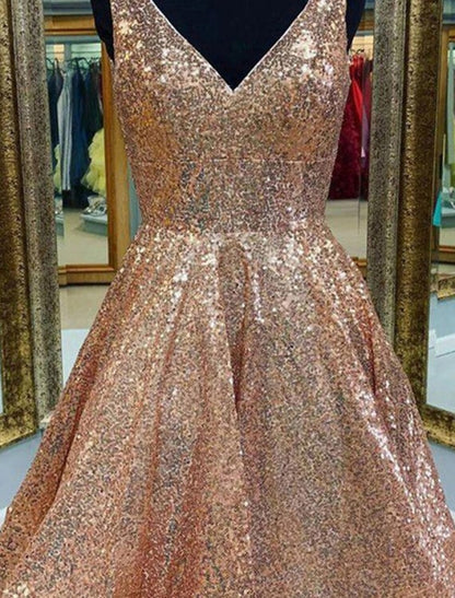 Full view of a sparkling A-line sequined homecoming dress with a V-neck.