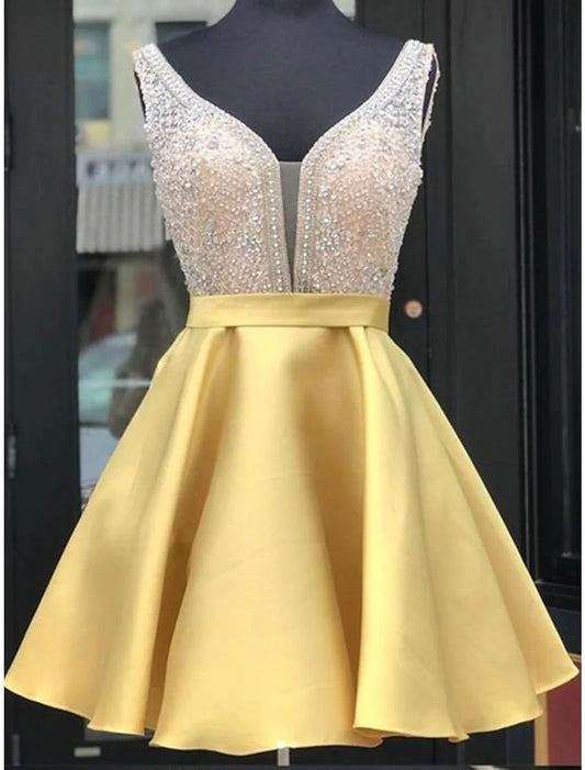 Sparkling A-Line short homecoming dress with V-neck and beading.