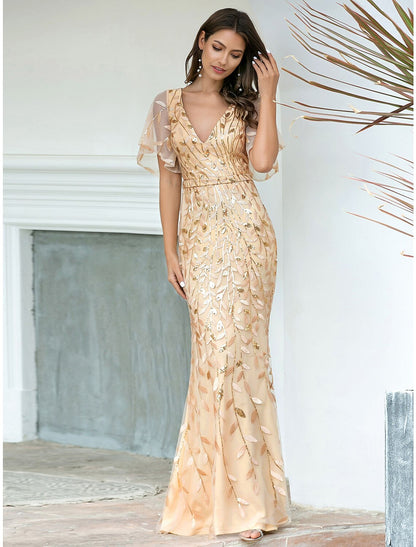 Side profile of the elegant mermaid trumpet evening gown, highlighting its silhouette.