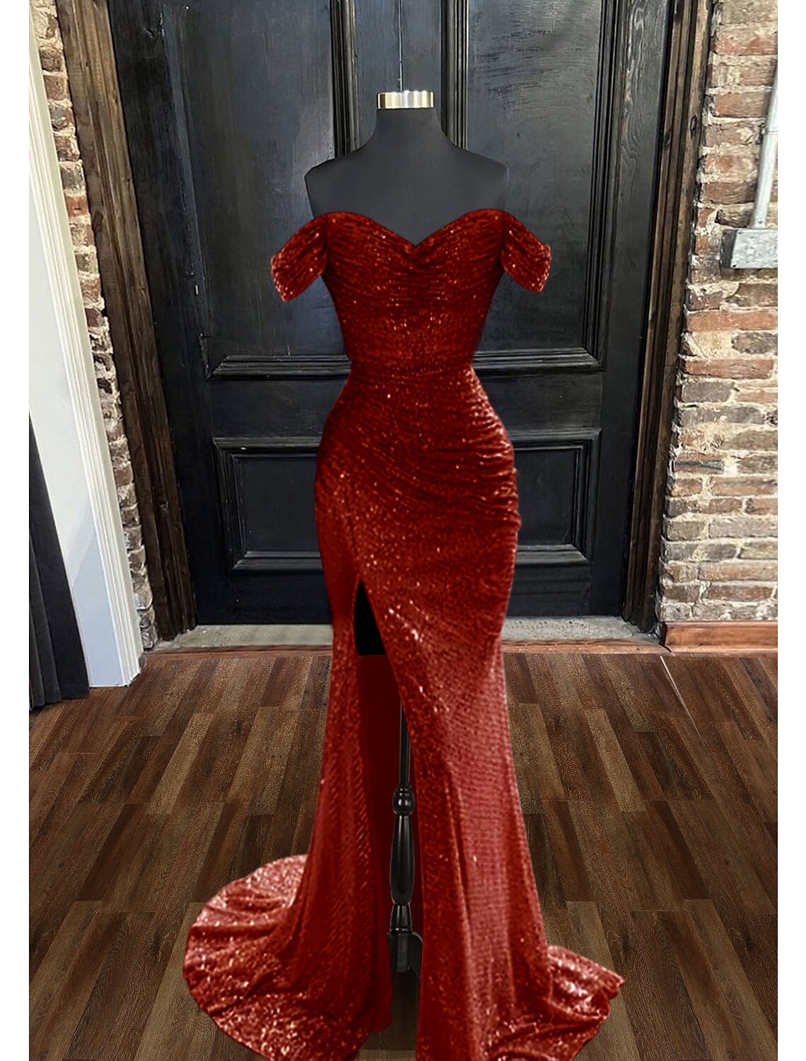 Back view of a model in a sequined floor-length prom dress.