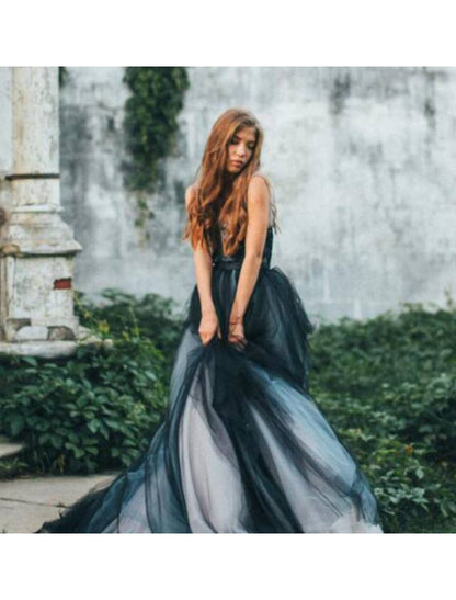 Close-up of the color block tulle skirt and intricate appliques on the Quinceanera dress.