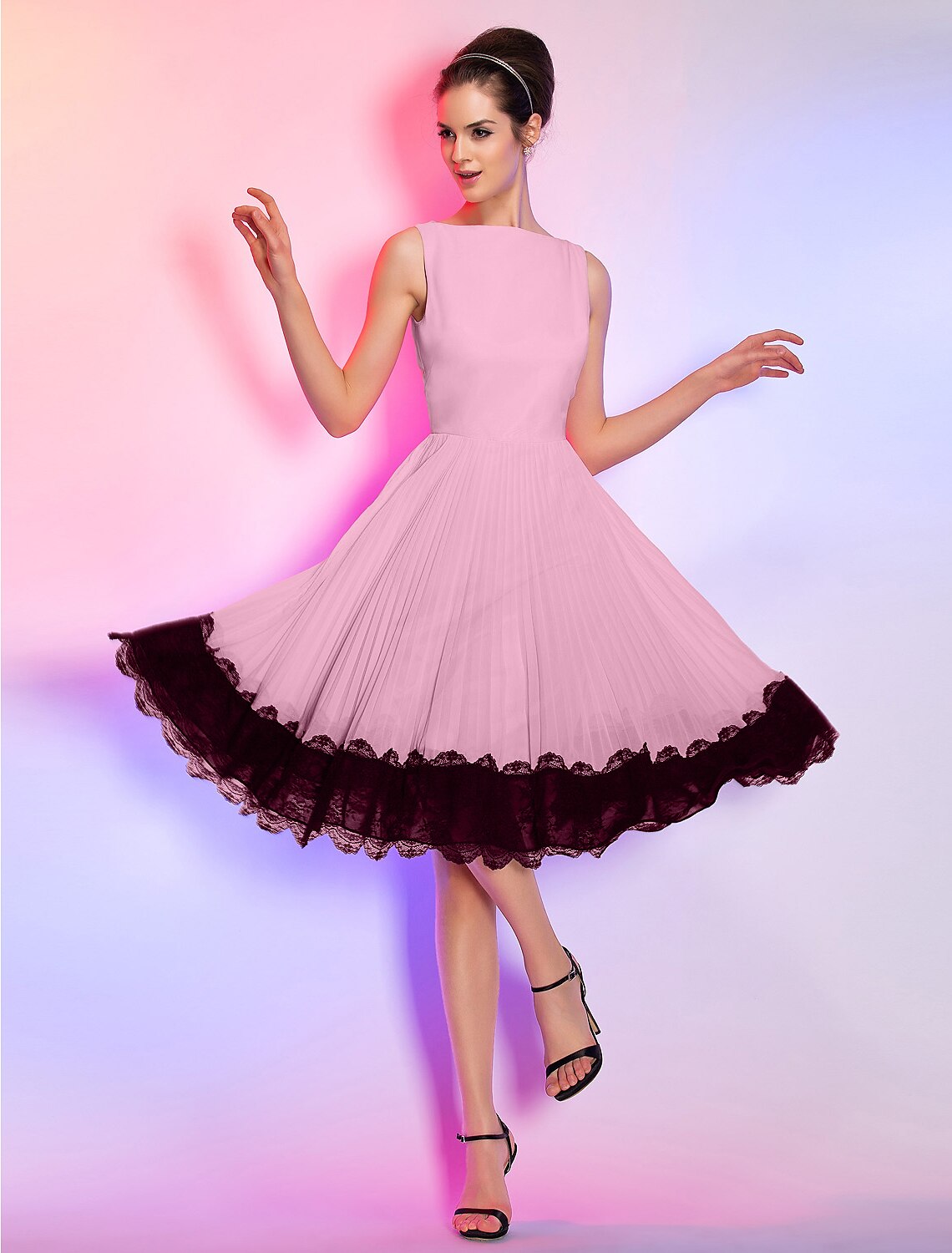 Sleeveless knee-length chiffon dress for homecoming.