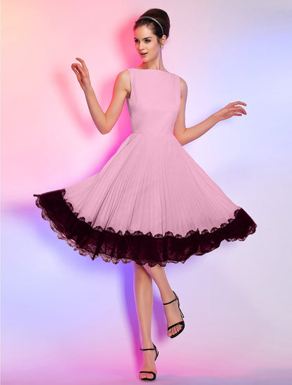 Sleeveless knee-length chiffon dress for homecoming.