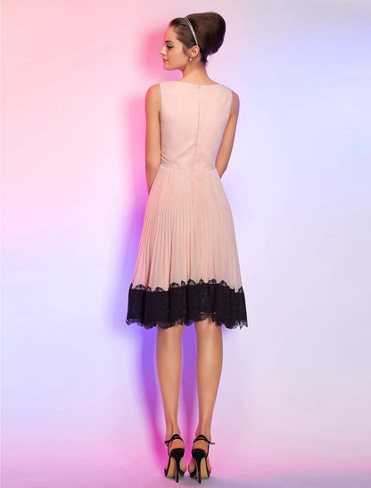 Elegant boat neck and sleeveless design of a homecoming dress.